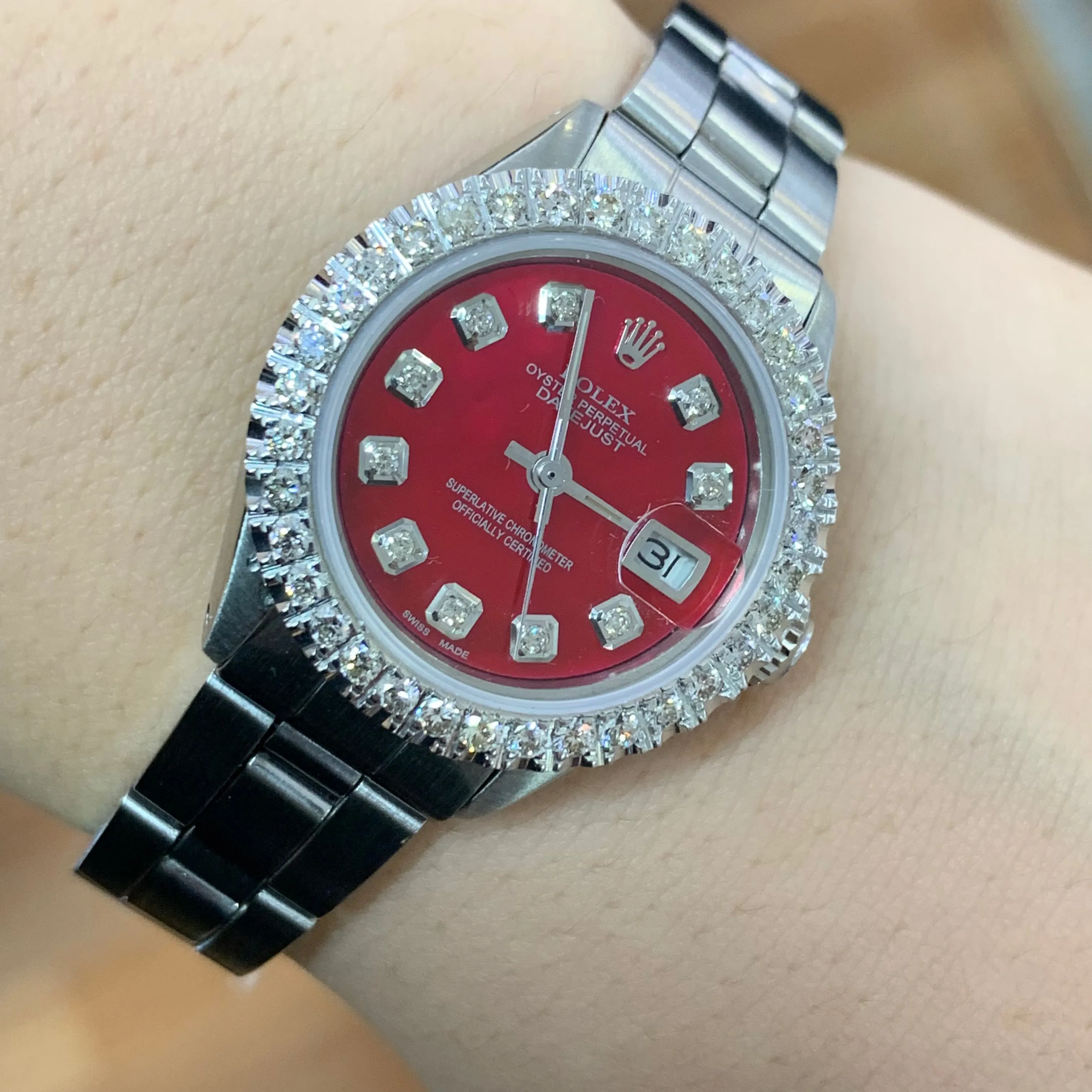 26mm Ladies` Rolex Diamond Watch with Stainless Steel Oyster Bracelet (custom red mother of pearl diamond dial, custom diamond bezel)