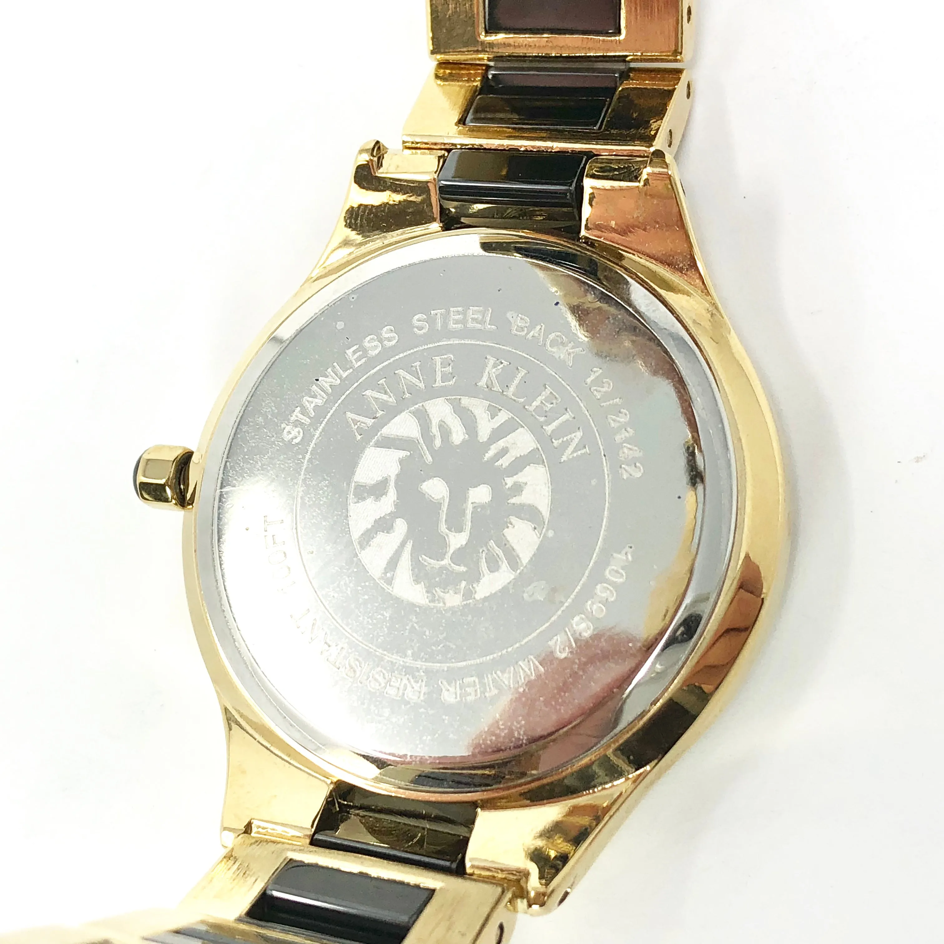Anne Klein Women's Swarovski Crystal Accented Gold-Tone and Black Ceramic Pyramid Watch