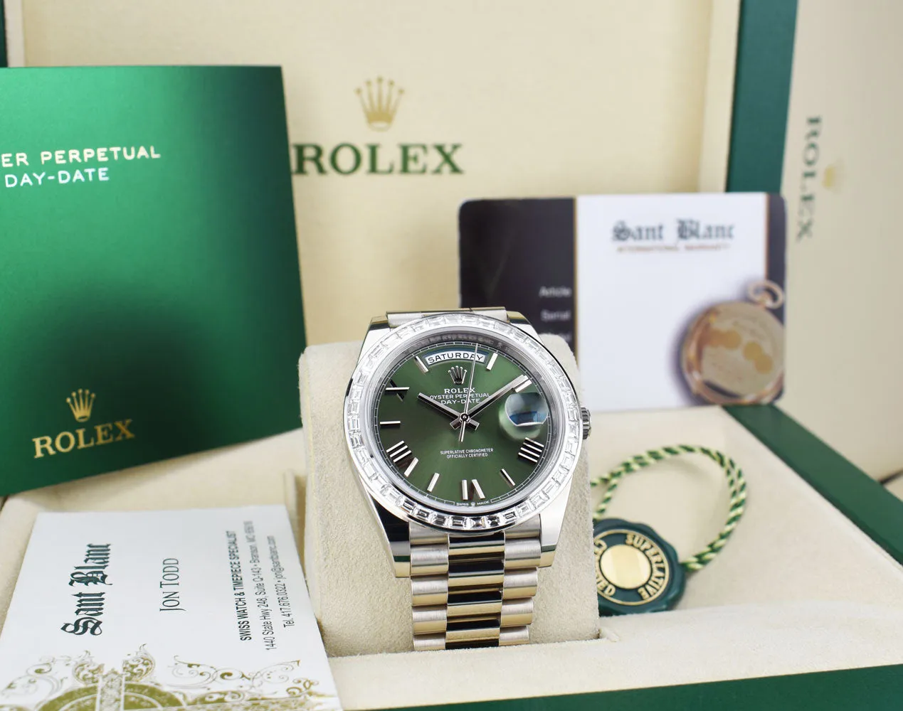 ROLEX 18kt White Gold Day Date 40 President Green Roman Dial Baguette Diamond Bezel Model 228239