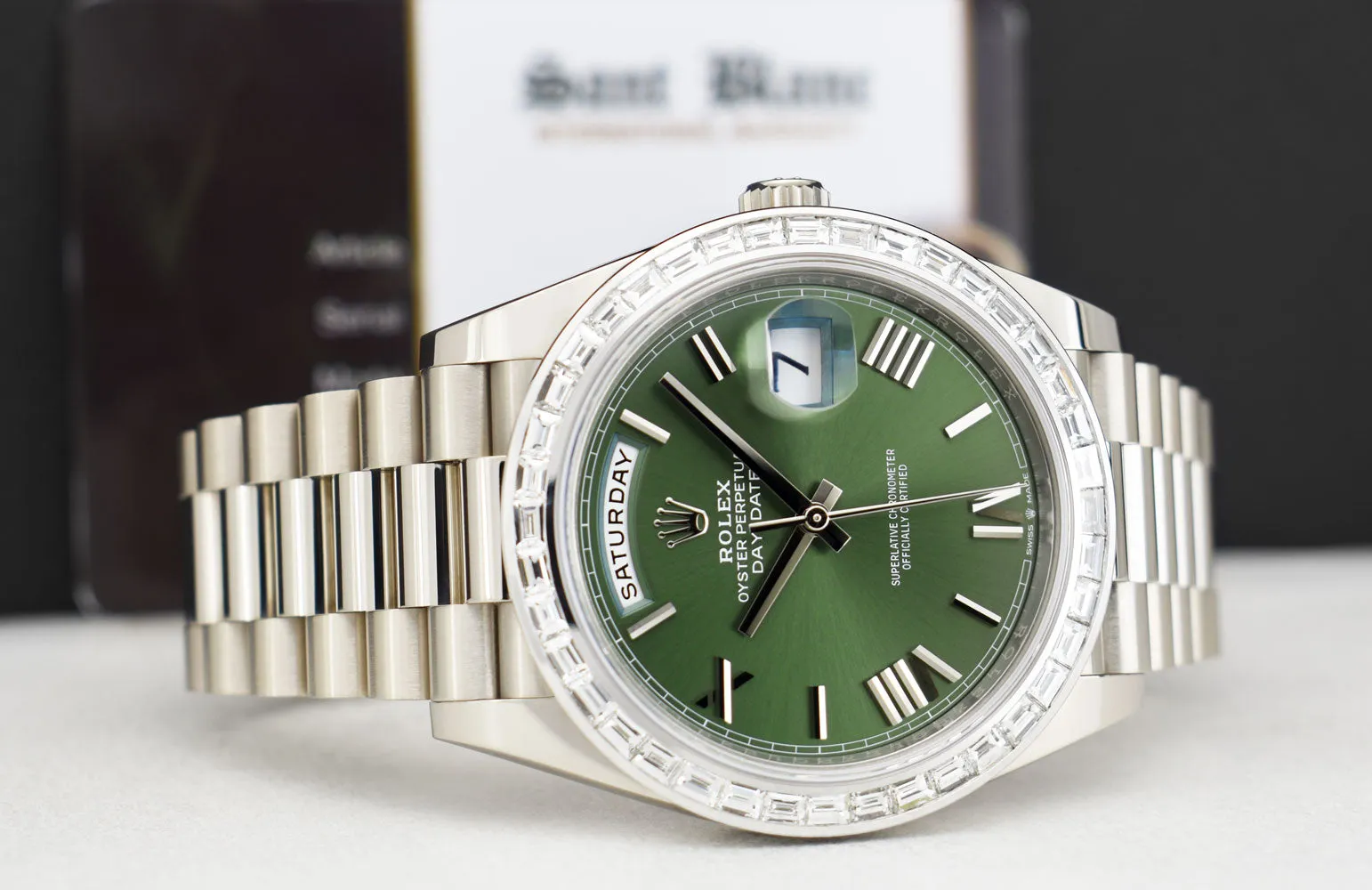 ROLEX 18kt White Gold Day Date 40 President Green Roman Dial Baguette Diamond Bezel Model 228239