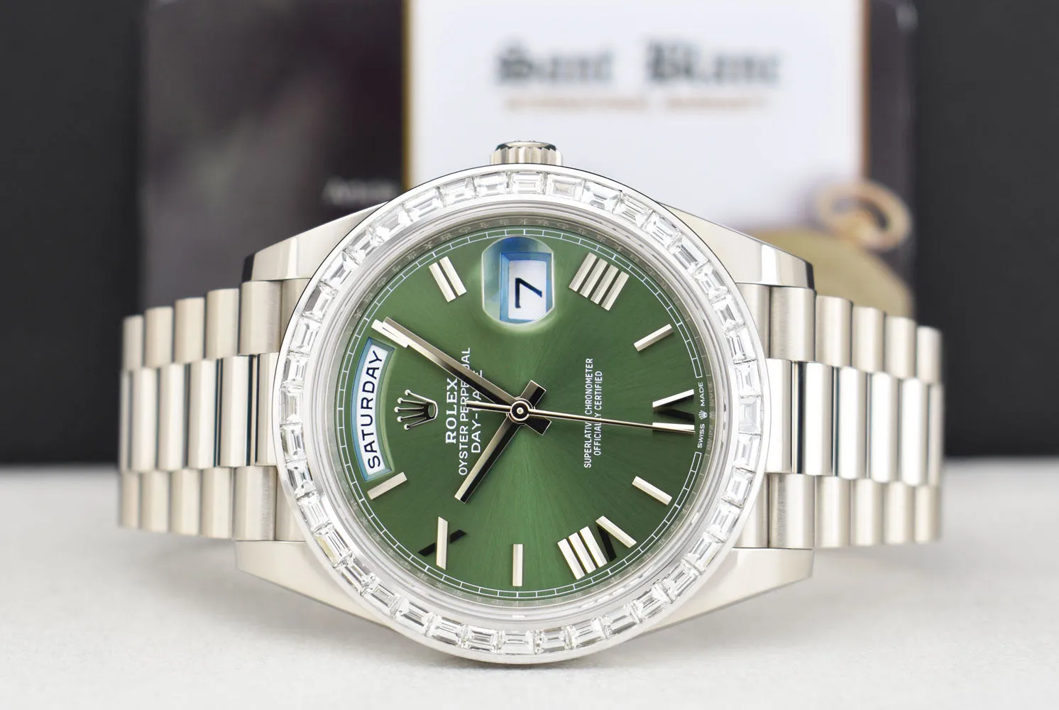 ROLEX 18kt White Gold Day Date 40 President Green Roman Dial Baguette Diamond Bezel Model 228239